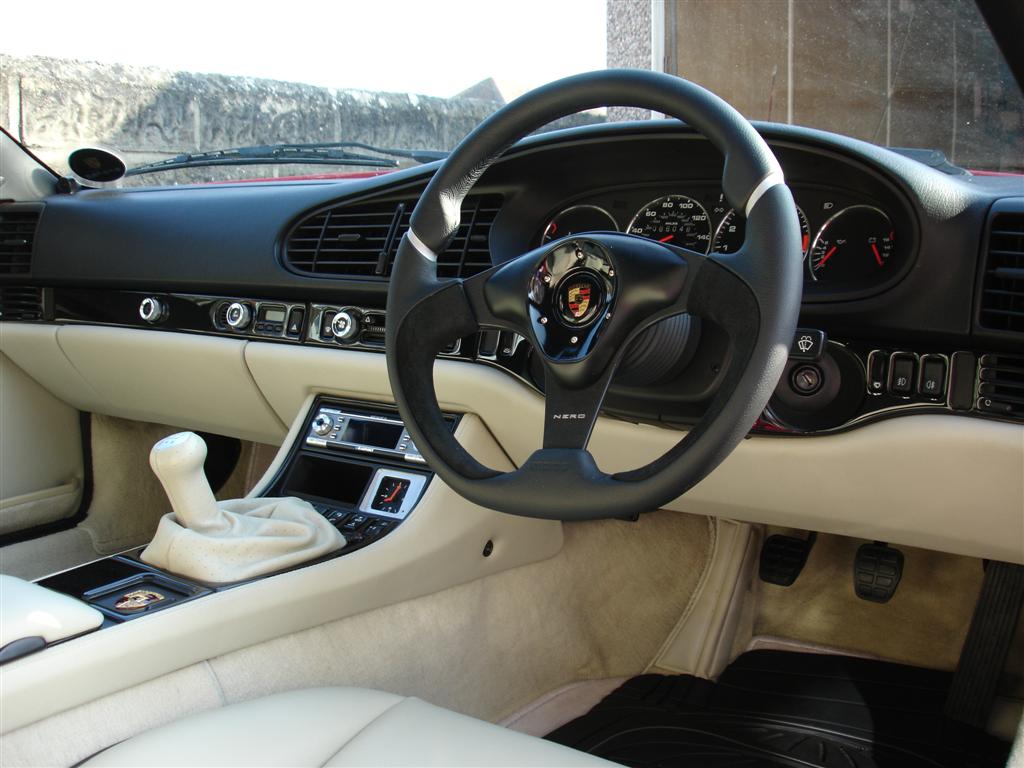 944 Cabriolet custom leather interior rear qtr panels.