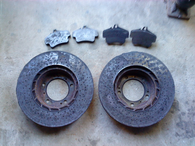Name:  old rotors and pads.JPG
Views: 87
Size:  113.7 KB