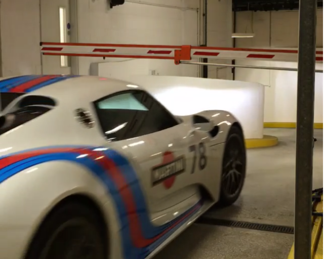 Size Matters: Porsche 918 Spyder Slips Under Parking Barrier