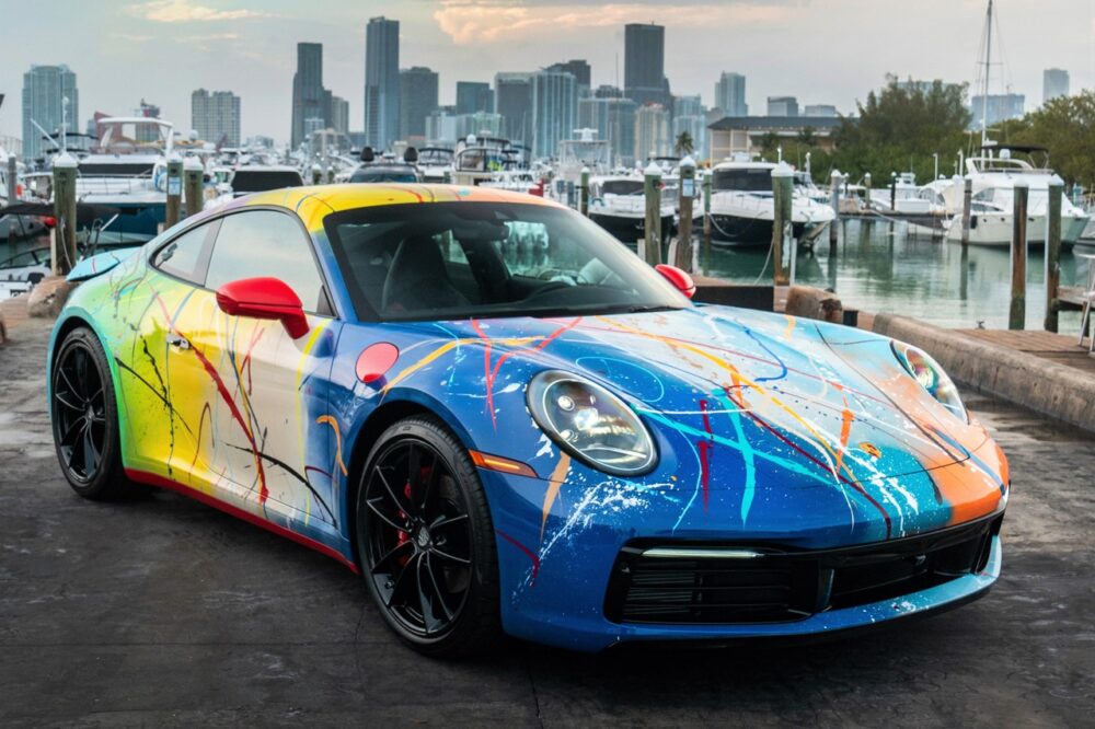 photo of Rich B Caliente & Rick Ross Artfully Designed Porsche 911 is Headed to Auction image